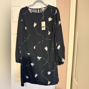 NEW WITH TAG. A new day black with white flowers dress. 3/4 sleeves. Never worn